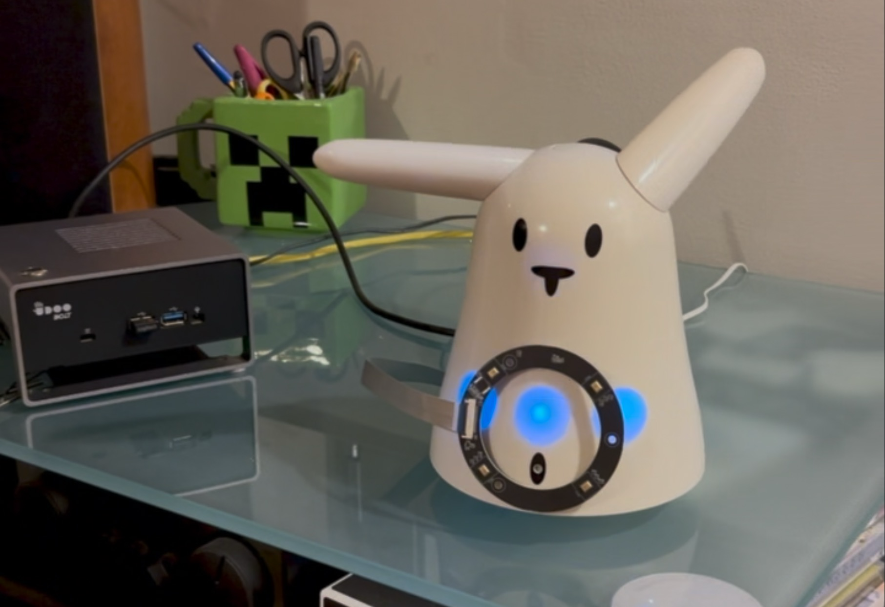 Nabaztag rabbit with LED ring next to a UDOO Bolt